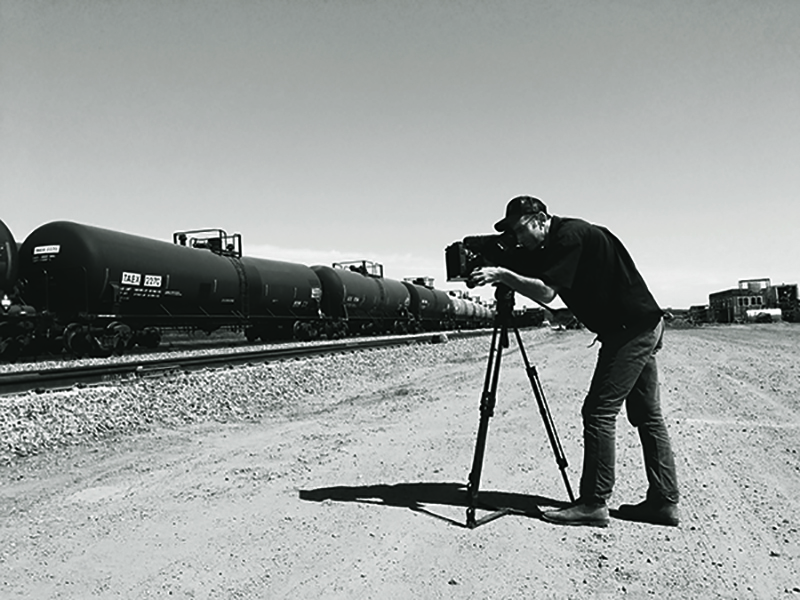 Jesse Moss shooting a scene for his documentary “Overnighters”