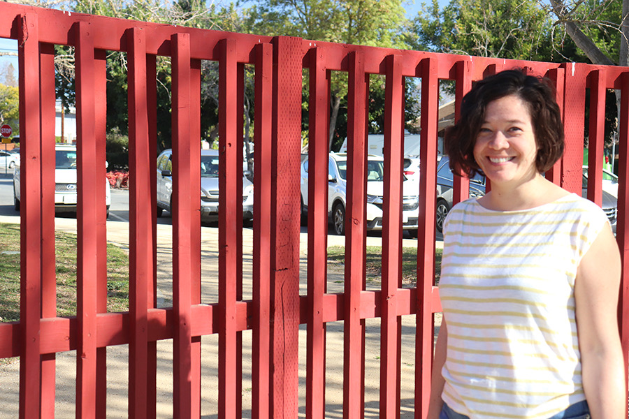 Ashley+Yee-Mazawa+admires+the+red+fence+at+Mitchell+Park+in+Palo+Alto%2C+California%2C+five+months+after+it+was+repainted+for+a+YCS+day+of+service+project+that+she+helped+coordinate+to+get+kids+more+involved+in+their+community.